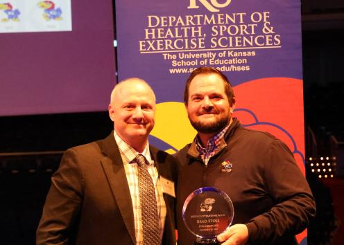 Brad Stoll 2024 HSES Outstanding Graduate Alumni with Dr. Jordan Bass
